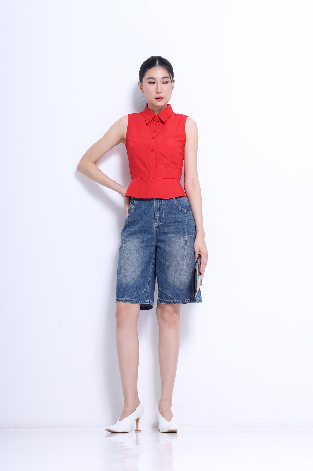 Nim Sleeveless Peplum Shirt
