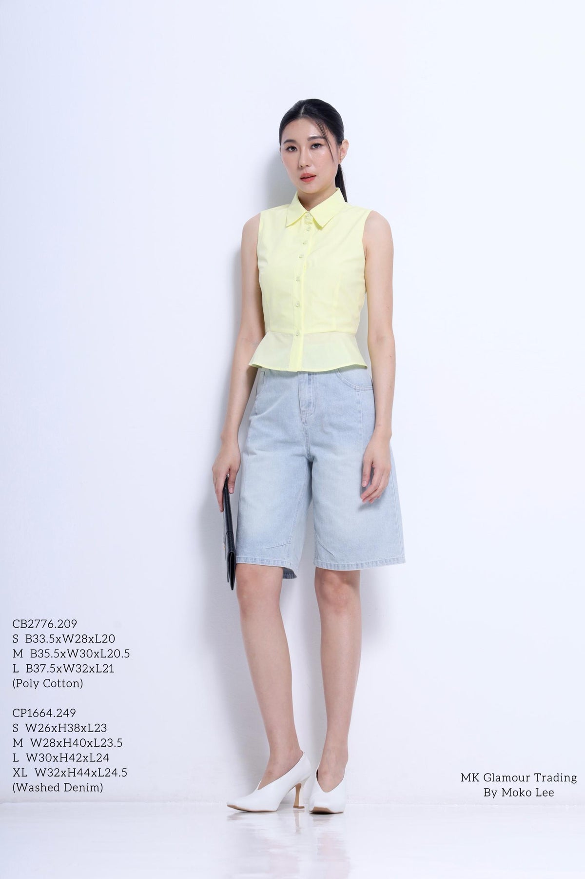 Nim Sleeveless Peplum Shirt