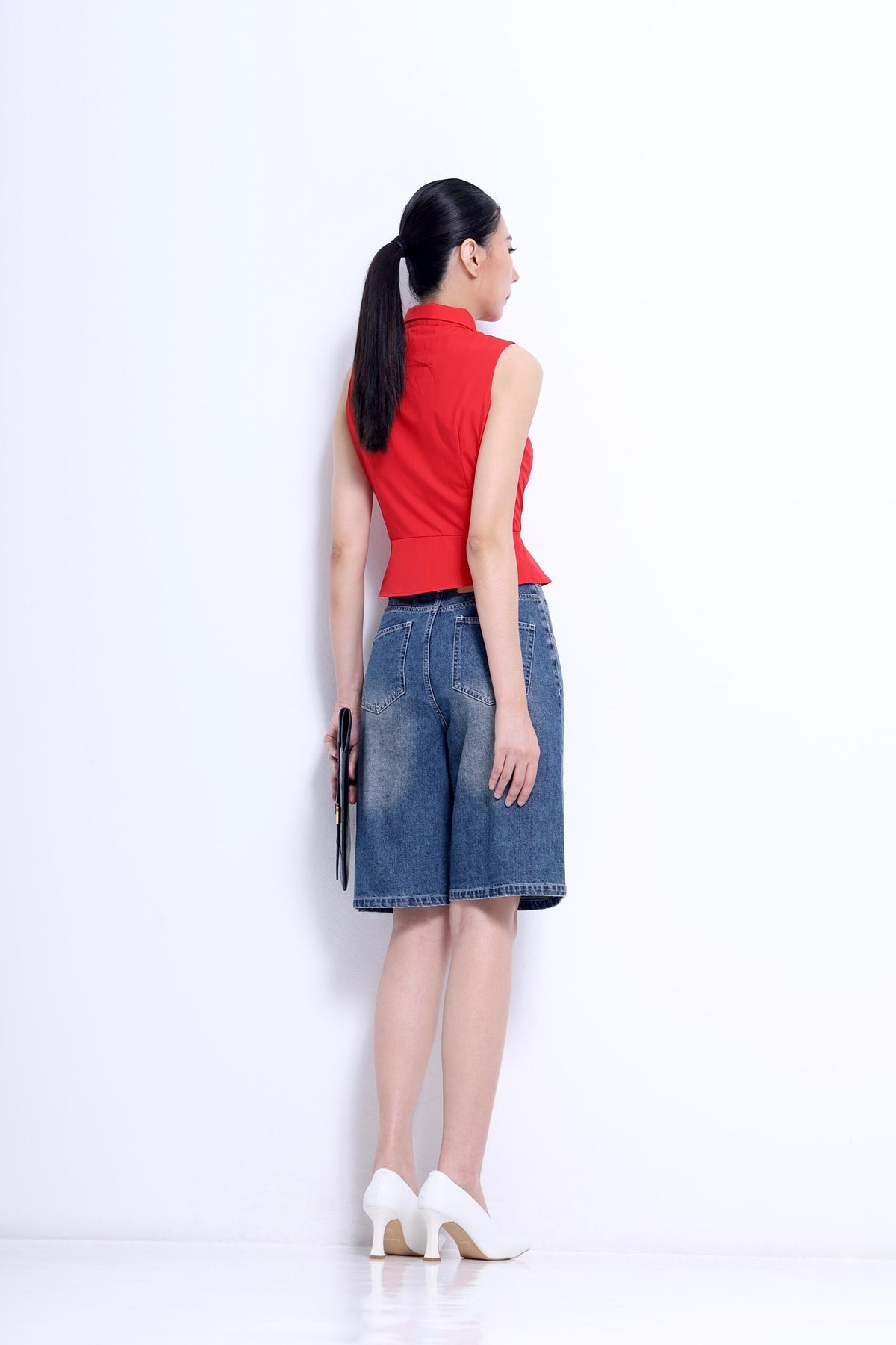 Nim Sleeveless Peplum Shirt