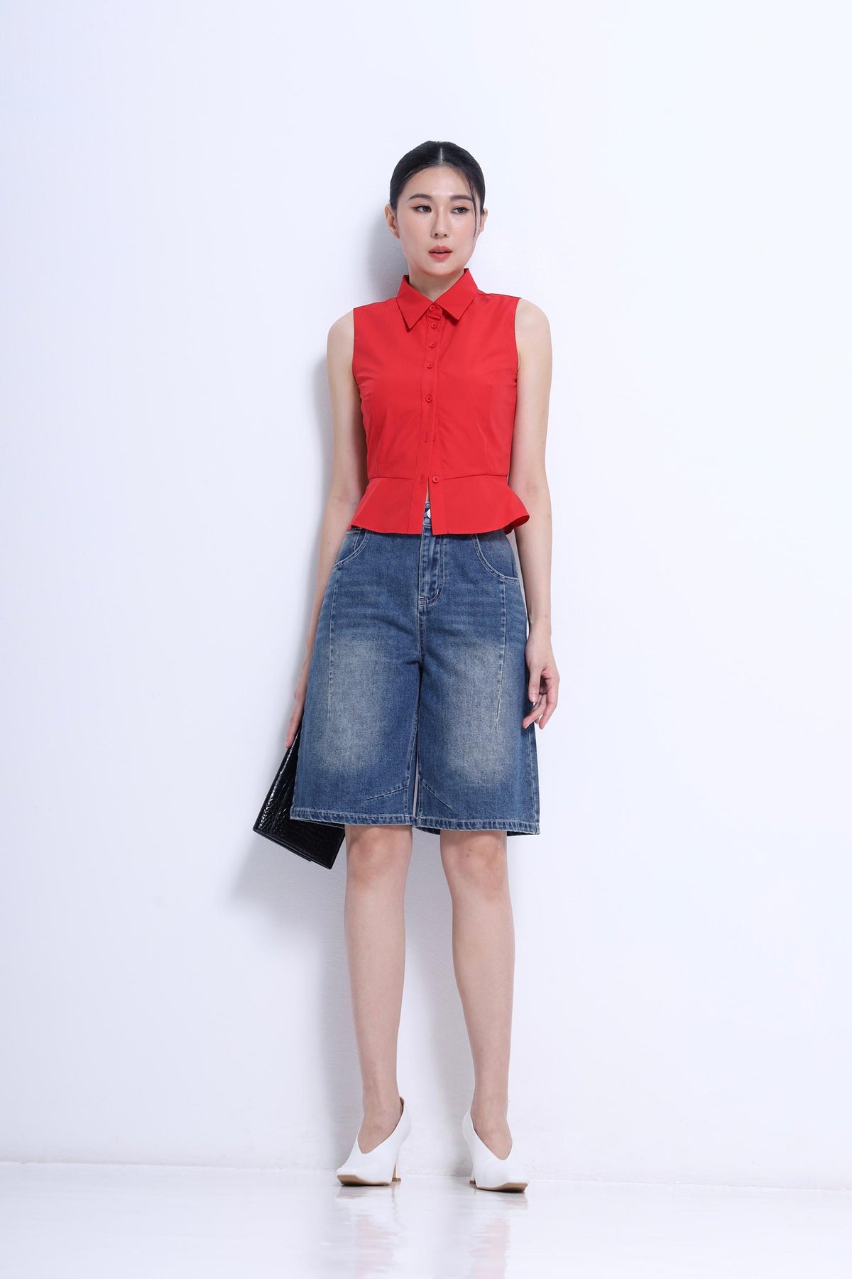 Nim Sleeveless Peplum Shirt