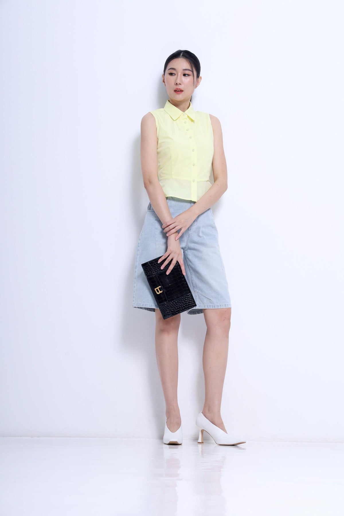 Nim Sleeveless Peplum Shirt