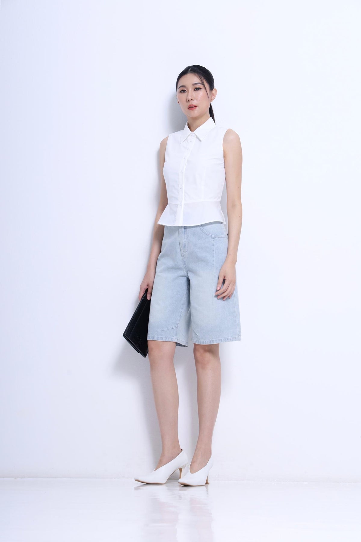 Nim Sleeveless Peplum Shirt
