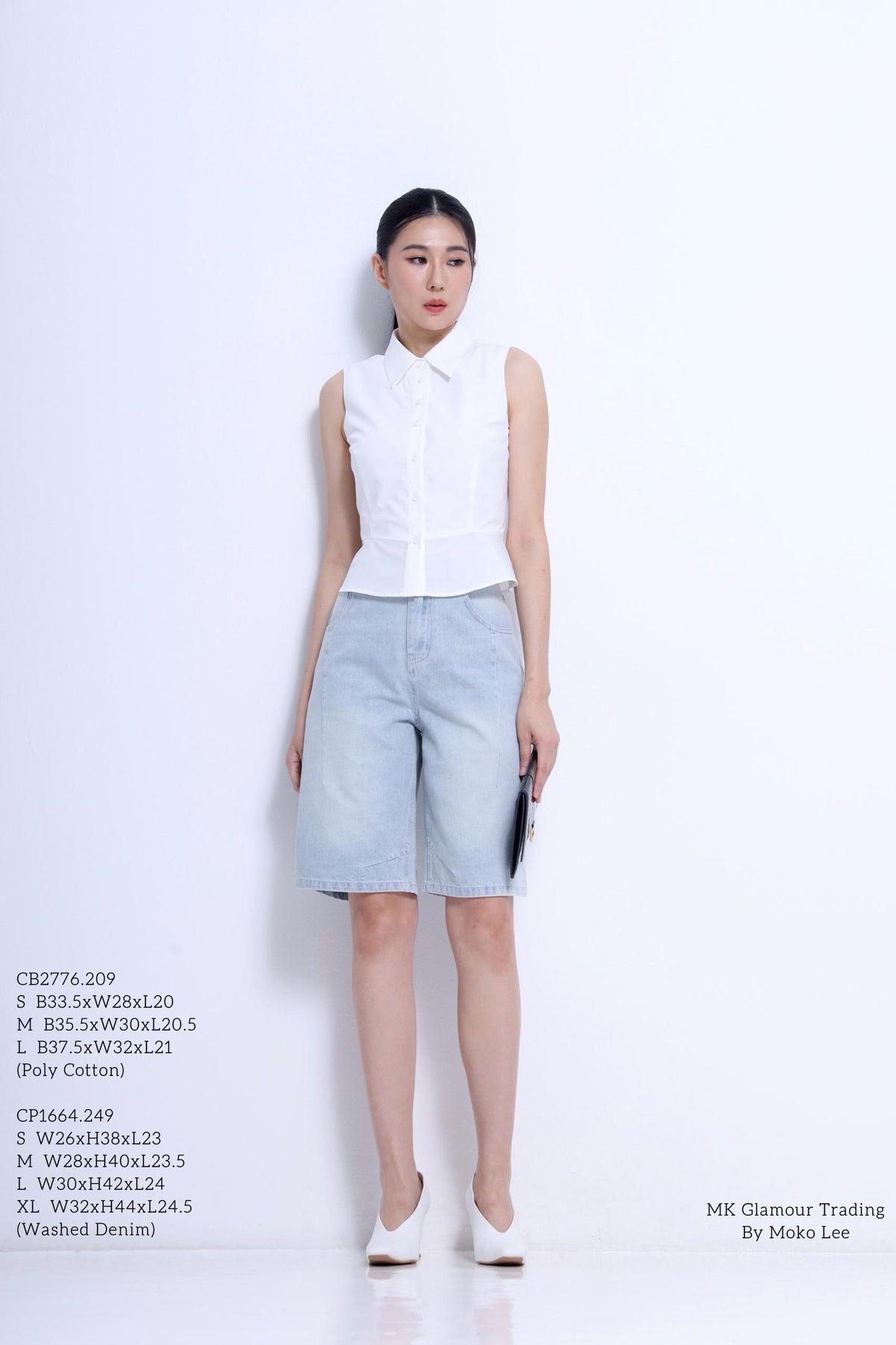 Nim Sleeveless Peplum Shirt