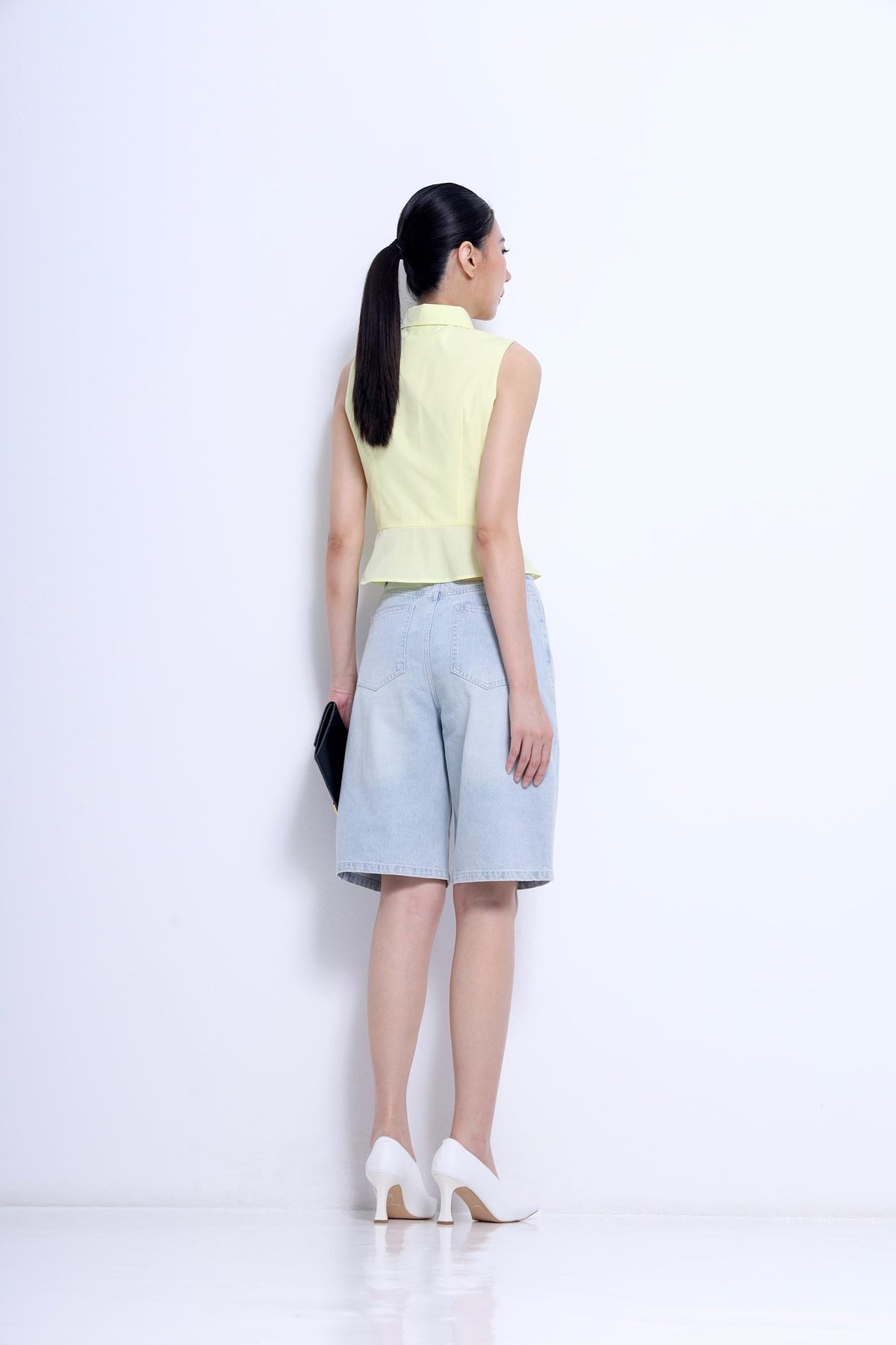 Nim Sleeveless Peplum Shirt