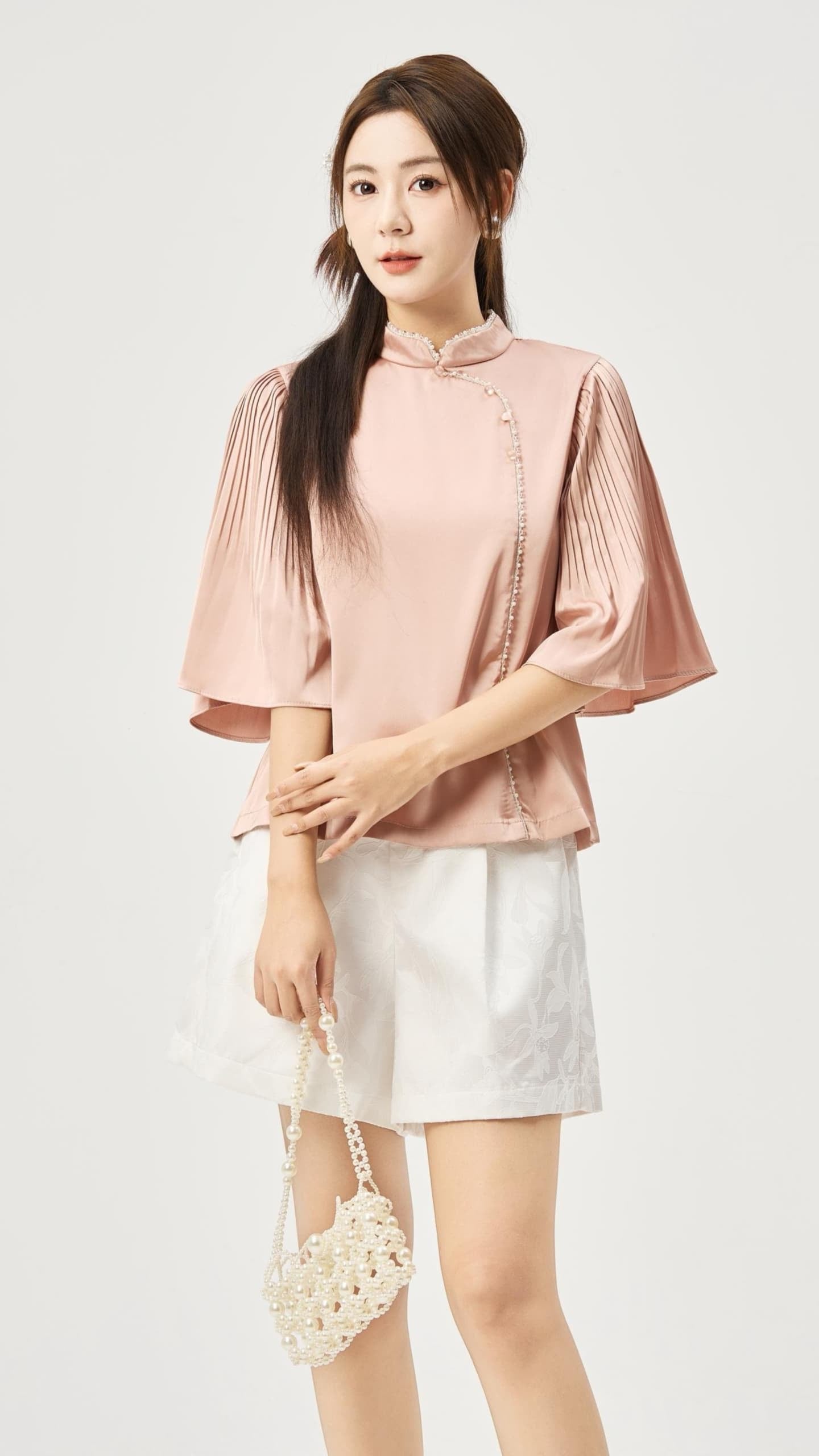 Zhu Oriental Pearl Pleated Top