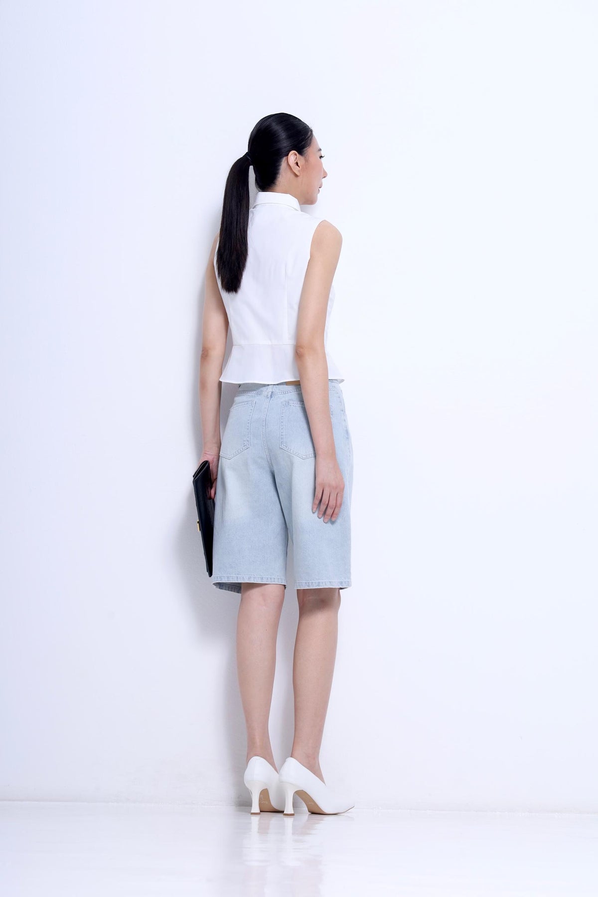 Nim Sleeveless Peplum Shirt
